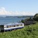 Railway NT200 series diesel railcar running along Nanao Bay (PoN太/PhotoAC)